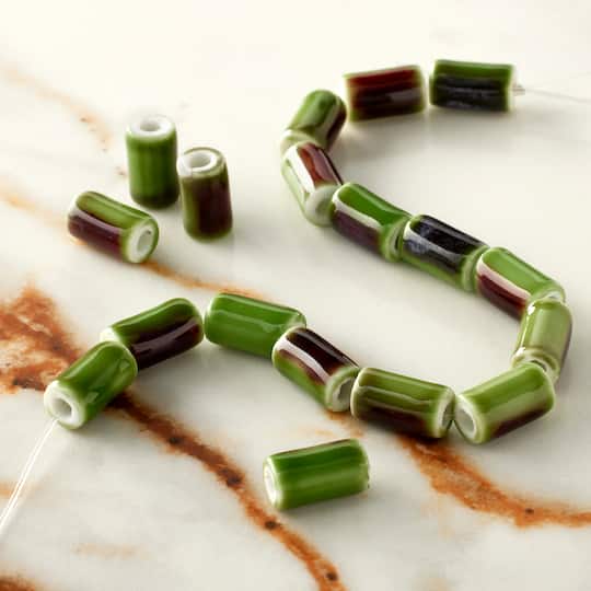 12 Packs: 18 ct. (216 total) Green Ceramic Tube Beads, 9.8mm by Bead Landing™